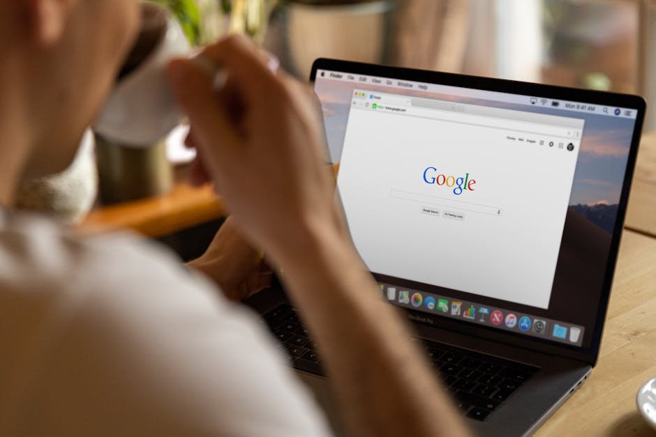 SEO professional analyzing Google Rank Tracker data with competitor rankings and SERP features displayed