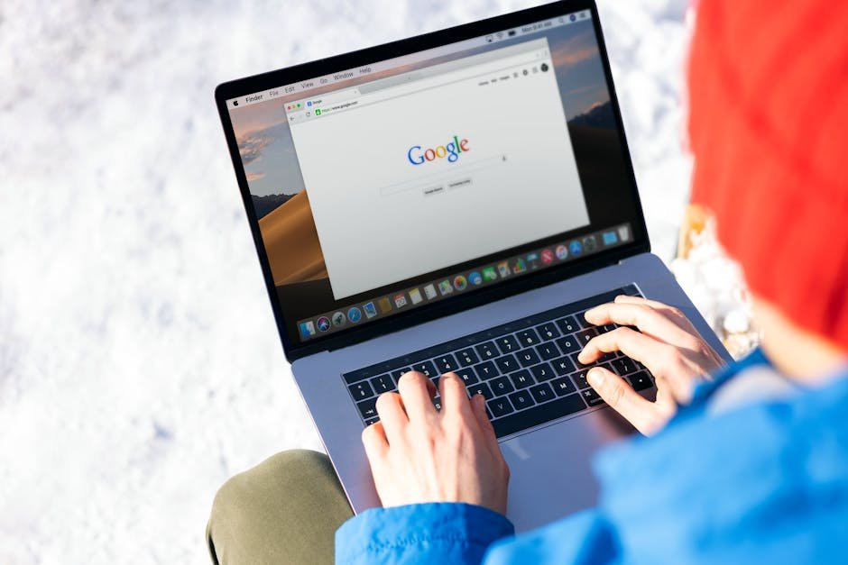 SEO professional using location changer tool to test international website rankings on laptop